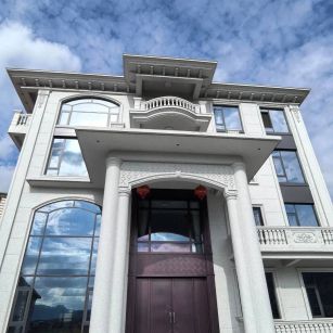 海东白麻别墅外墙干挂石材效果示例