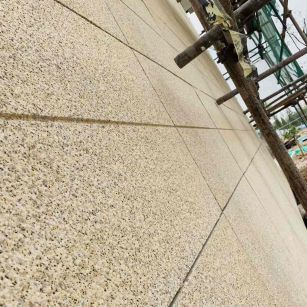 海东 黄金麻花岗岩荔枝面外墙干挂石材效果示例