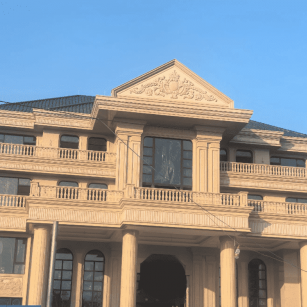 海东黄金麻别墅外墙干挂石材效果示例