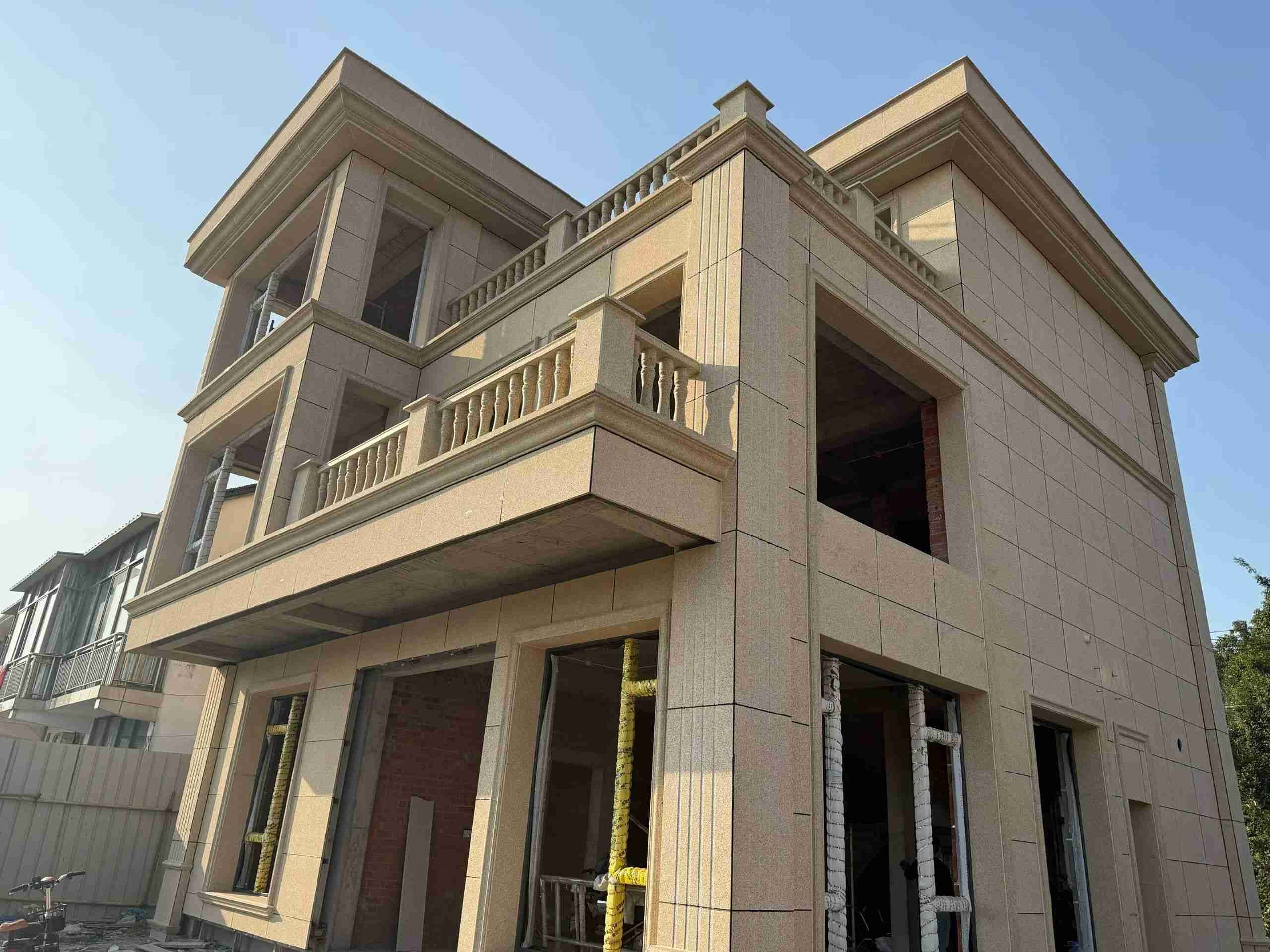 海东 黄金麻花岗岩石材荔枝面外墙干挂效果展示