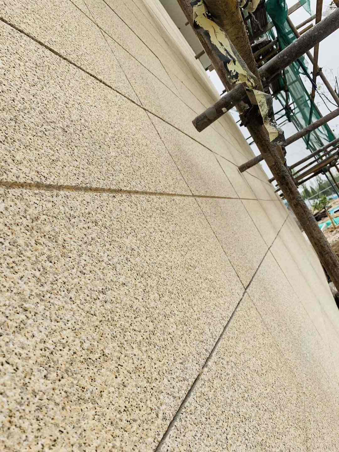 海东 黄金麻花岗岩荔枝面外墙干挂石材效果示例